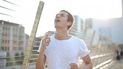 Man jogging in white t-shirt